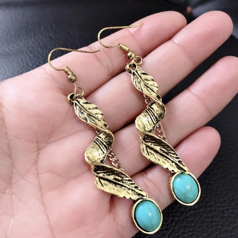 Silver alloy leaf earrings with turquoise artificial stones, elegant and lightweight jewelry by Plush Fashion Hub.
