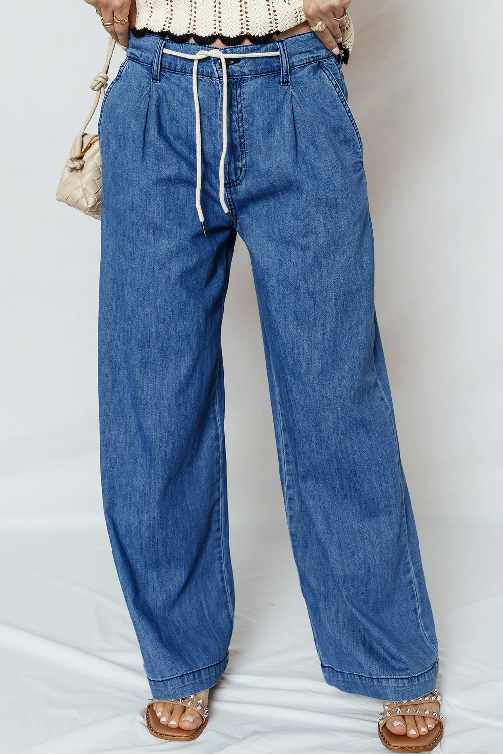 Light blue Oakleigh On Wide Leg Jeans by Threaded Pear, showing the relaxed fit and wide leg style on a model.