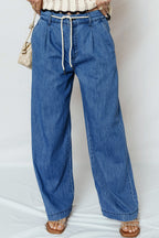 Light blue Oakleigh On Wide Leg Jeans by Threaded Pear, showing the relaxed fit and wide leg style on a model.