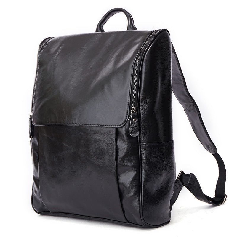 Black leather computer backpack by Pi-Mart, first layer durable leather bag with multiple compartments for laptops and accessories.