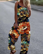 Women's butterfly print sleeveless overalls with loose fit suspender pants by FitiqueFit, displayed on a hanger.