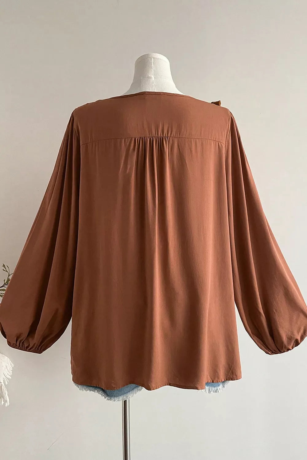Plus size Trendsi V-neck embroidered tassel long sleeve blouse, stylish top with embroidery and tassel details, perfect for casual wear