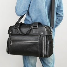 Genuine leather men's briefcase with large capacity, cowhide first-layer leather, horizontal design, suitable for computer storage.