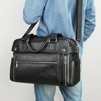 Genuine leather men's briefcase with large capacity, cowhide first-layer leather, horizontal design, suitable for computer storage.