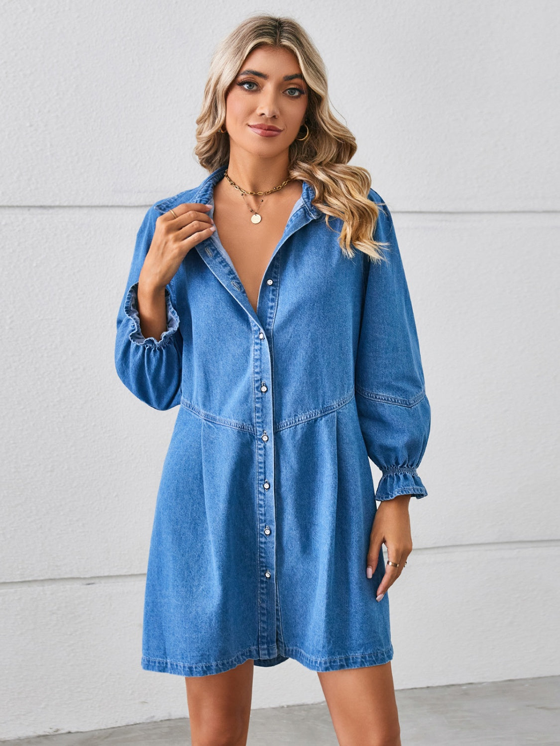 Button-up mini denim dress with flounce sleeves from Plush Fashion Hub, featuring a stylish casual look and classic denim fabric.