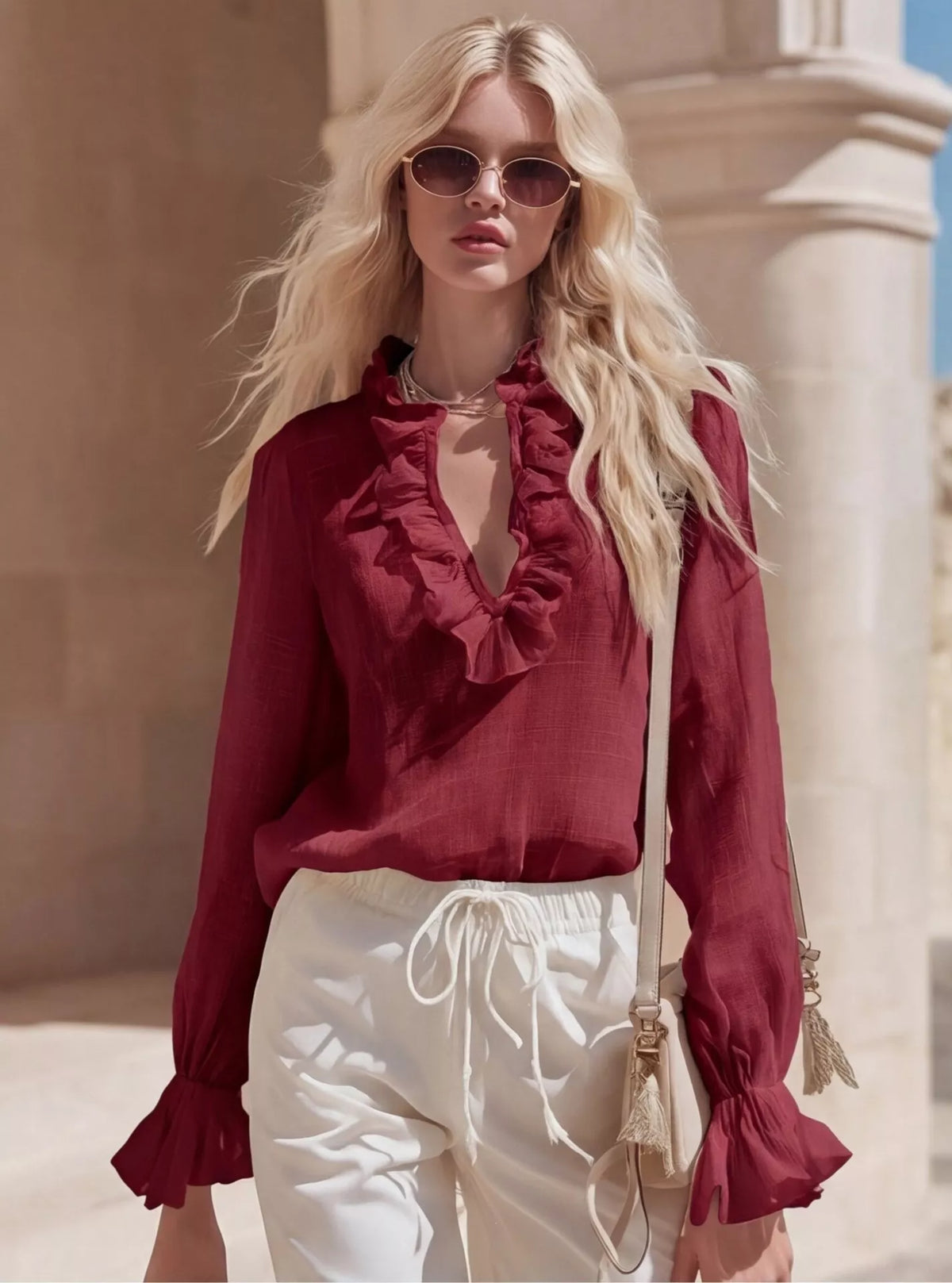 Plush Fashion Hub ruffled v-neck long sleeve blouse with feminine details and soft fabric, displayed on a mannequin.