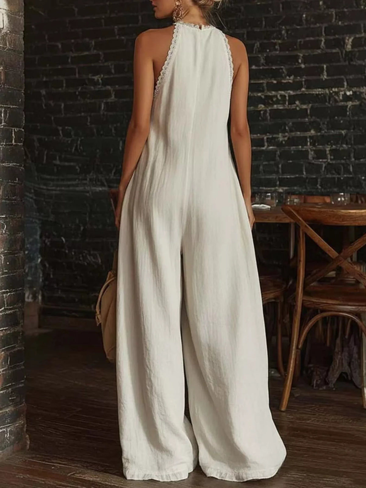Plus size halter neck lace trim wide-leg jumpsuit by Plush Fashion Hub, featuring a stylish full-size playsuit with a halter neckline.