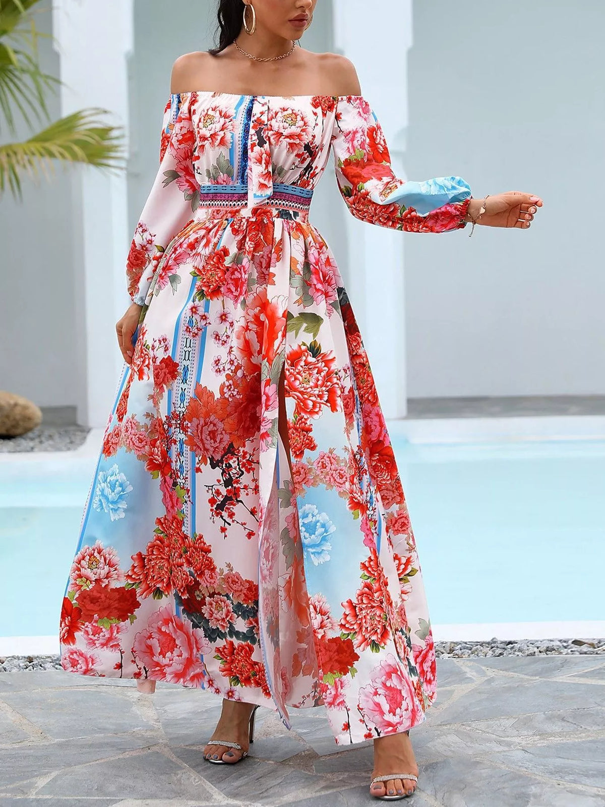Plush Fashion Hub off-shoulder printed maxi dress with slit, flowing fabric, and vibrant pattern, perfect for casual or dressy occasions.