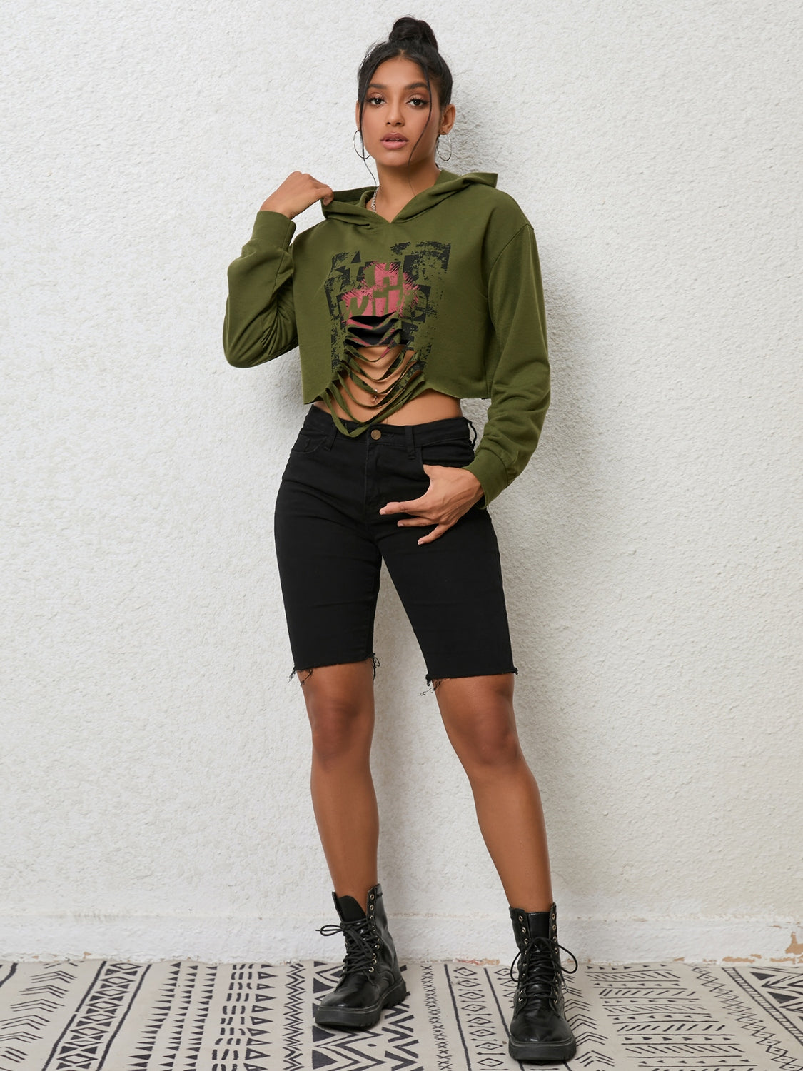 Plush Fashion Hub long sleeve hoodie with cutout design, soft fabric, and stylish fit, perfect for casual wear.