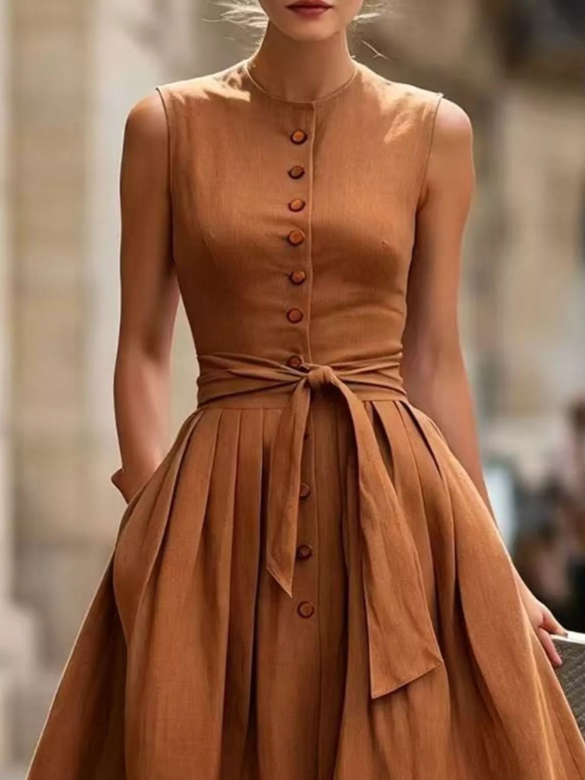 Plus size sleeveless button-front belted midi dress by Trendsi, featuring a full-length design and stylish waist belt.