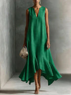 Women's deep V-neck sleeveless asymmetrical maxi dress with patchwork design by FitiqueFit, featuring a flowing, stylish silhouette.