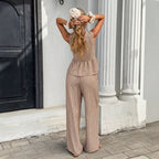 Women's striped sleeveless top and wide-leg pants two-piece set in casualwear style from Plush Fashion Hub, shown in the image.