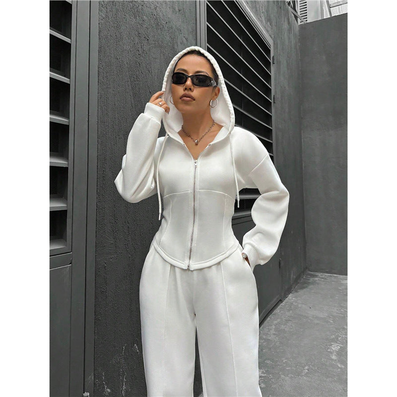 Relaxed hooded zip-up top and wide-leg trousers two-piece set by Plush Fashion Hub, made from soft, comfortable fabric.