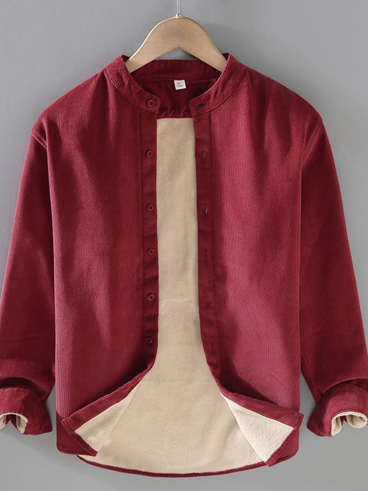 Men's plus size button-up long sleeve jacket by Trendsi, shown in dark fabric with front buttons and collar.