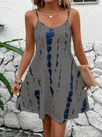Plus size women's summer halter dress by FitiqueFit in four colors, featuring a flowy design and adjustable straps.