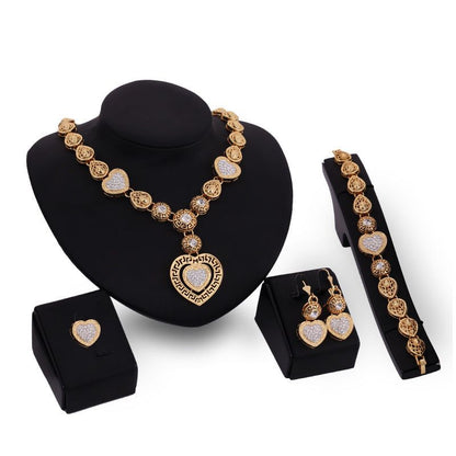 Foreign trade classic alloy jewelry four sets of exaggerated bride wedElevate your bridal game with our classic alloy jewelry set! Featuring four pieces that exude opulence and charm, this set will complement any wedding dress and add JewelryPlush Fashions ShopPlush Fashion Shop