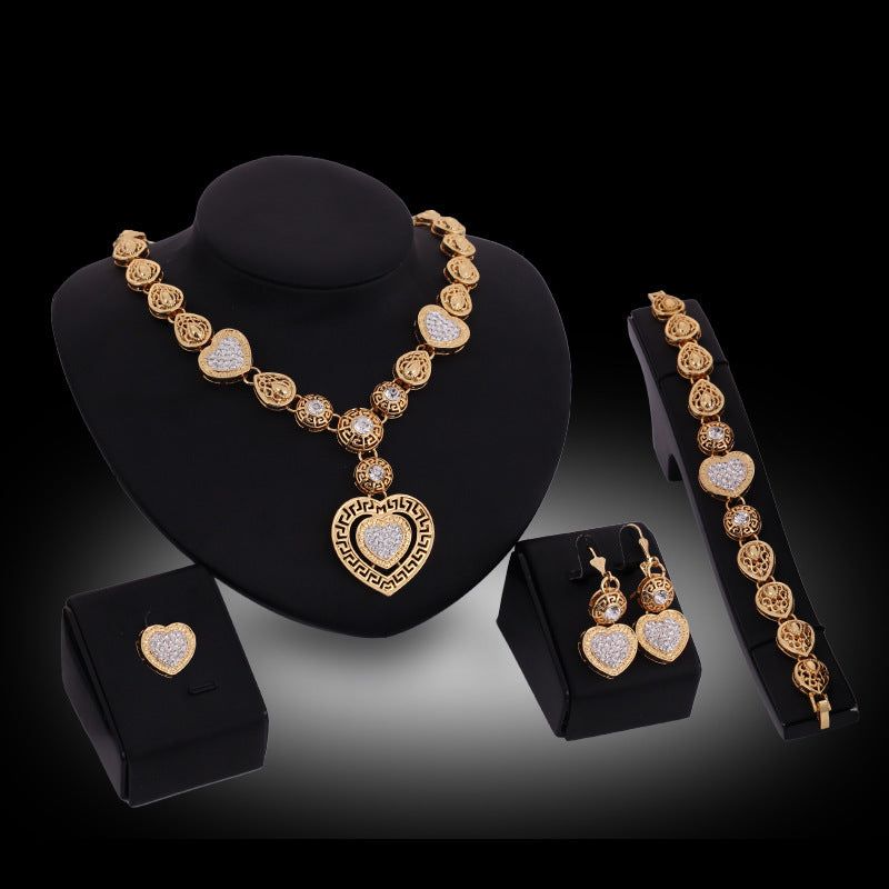 Foreign trade classic alloy jewelry four sets of exaggerated bride wedElevate your bridal game with our classic alloy jewelry set! Featuring four pieces that exude opulence and charm, this set will complement any wedding dress and add JewelryPlush Fashions ShopPlush Fashion Shop