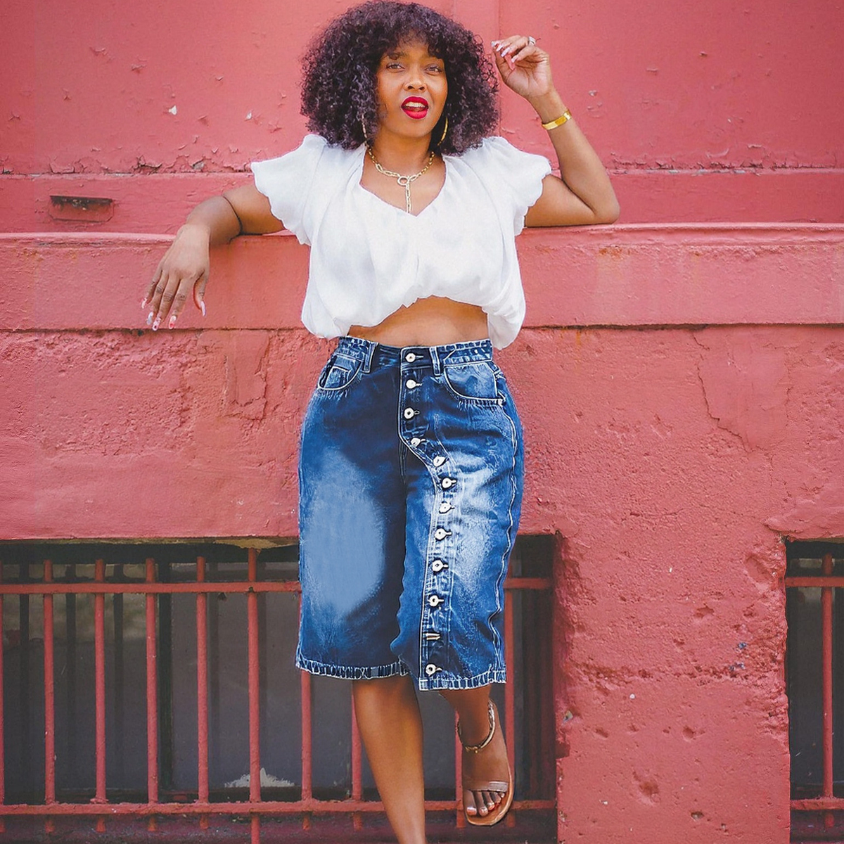 High-waisted denim shorts with multiple buttons from Plush Fashion Hub, featuring a classic blue denim wash and distressed details.