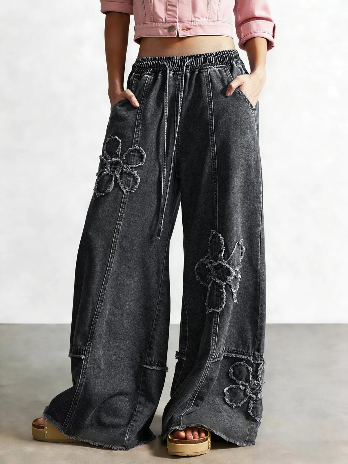 Trendsi women's flower print wide-leg jeans with high waist and relaxed fit, stylish denim with floral design.