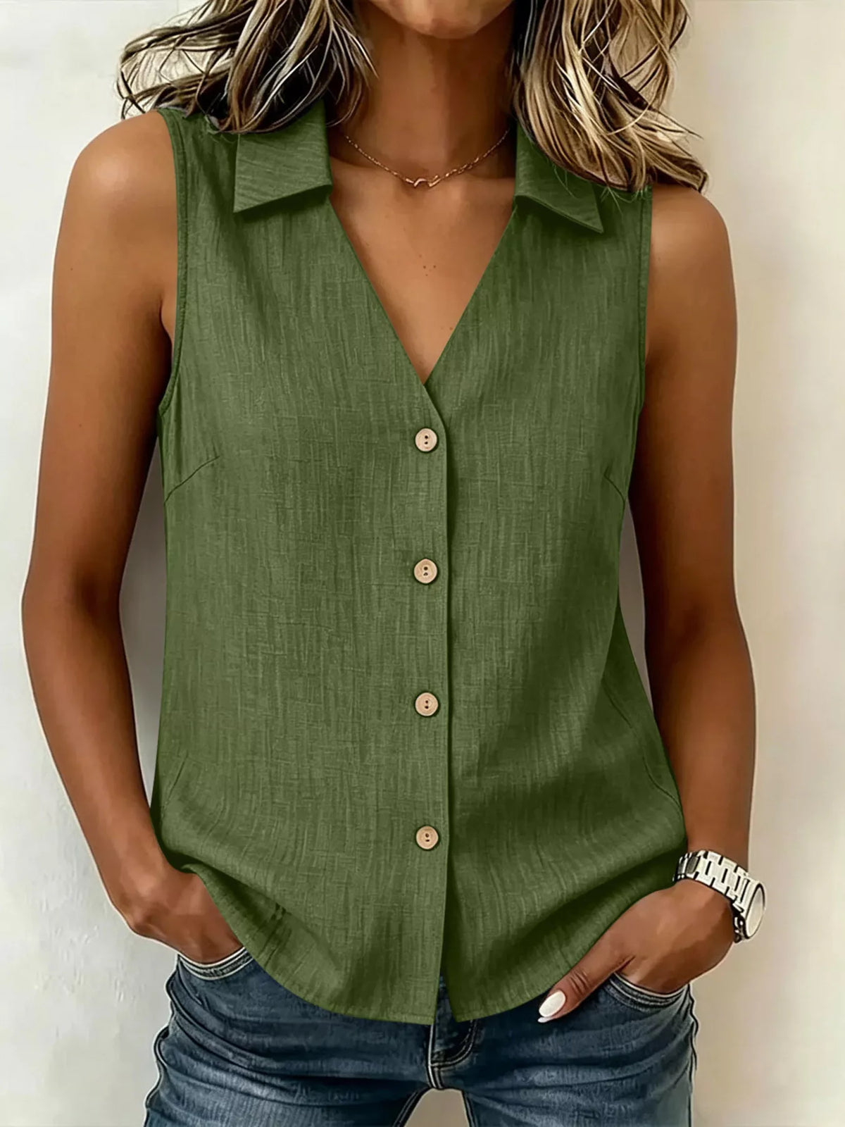 Plus size sleeveless collared button-up top from Trendsi, featuring a stylish full button front and classic collar detail.