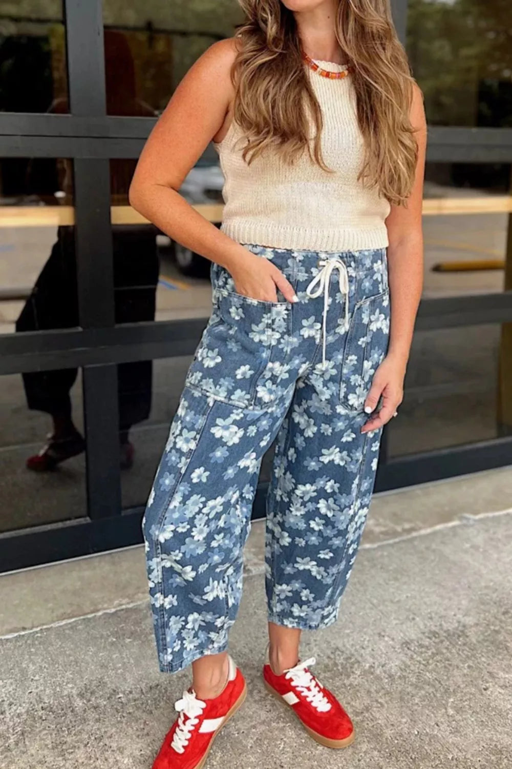 Dainty floral printed drawstring barrel jeans from Plush Fashion Hub featuring a relaxed fit and floral design.