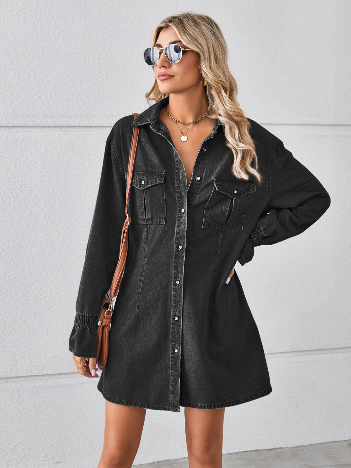 Pocketed dropped shoulder mini denim dress by Plush Fashion Hub, featuring a relaxed fit and casual style.