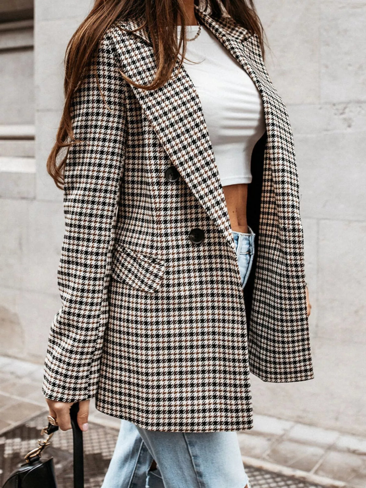 Classic houndstooth double-breasted blazer by Trendsi, featuring tailored fit and stylish pattern, shown on a model.