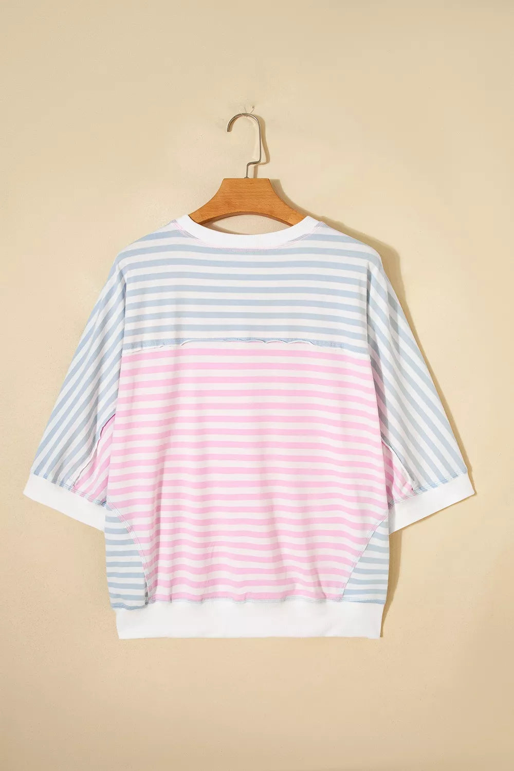 Casual oversized striped dolman sleeve patchwork T-shirt by Plush Fashion Hub, featuring a relaxed fit and colorful patchwork design.