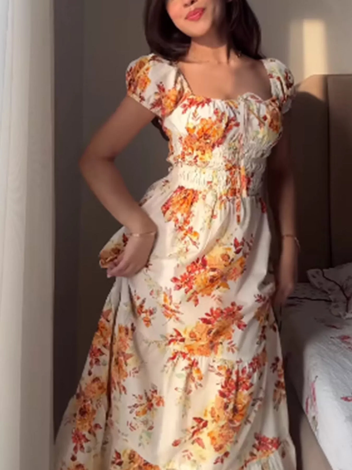 Women’s floral print short sleeve ruched maxi dress by Plush Fashion Hub, featuring a flowing silhouette and vibrant floral pattern.