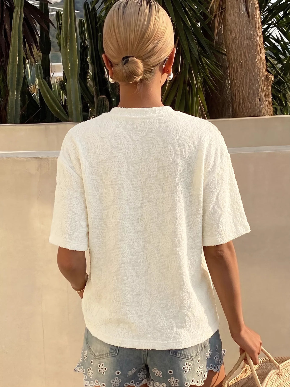 Plush Fashion Hub textured paisley casual T-shirt with a comfortable fit, featuring intricate paisley patterns on soft fabric.