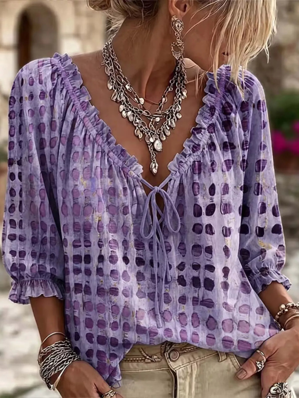 Plus size Trendsi blouse with tie neck and 3/4 sleeves, stylish full-size women's blouse featuring a modern design.