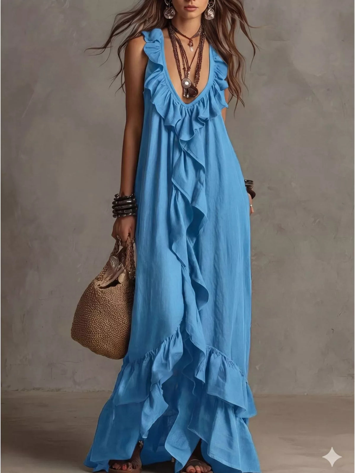 Ruffled sleeveless maxi dress in flowing fabric with tiered layers, designed by Plush Fashion Hub for elegant summer wear.