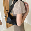 PU Leather Drawstring Shoulder Bag in black, stylish and compact for essentials, perfect for fashion-forward individuals.