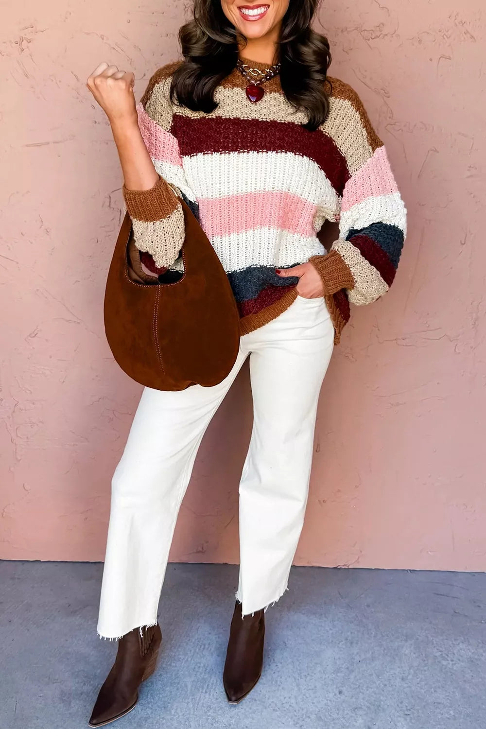 Striped knit dropped shoulder round neck sweater by Trendsi, featuring a cozy design and casual fit.
