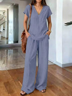 Plus size Trendsi loungewear set with v-neck short sleeve top and matching pants, comfortable and stylish for relaxed wear.