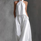 Women's loose sleeveless top and high-waist wide-leg pants casualwear set by FitiqueFit in four color options, front view.
