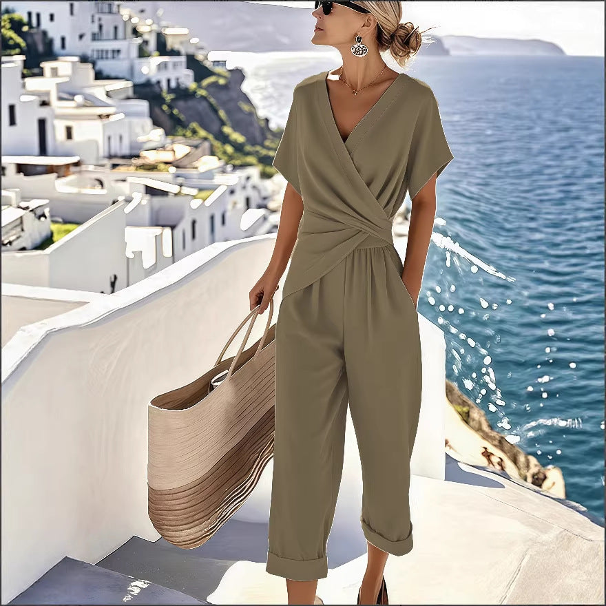 Women's loose irregular short-sleeve two-piece casualwear set by FitiqueFit, featuring a relaxed fit top and matching shorts.