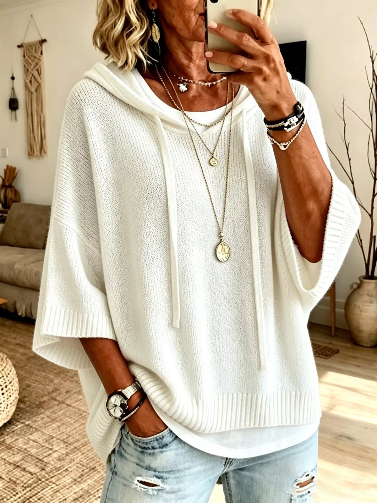 Plus size full-length hooded sweater with drawstring, 3/4 sleeves, in a cozy knit, by Trendsi.