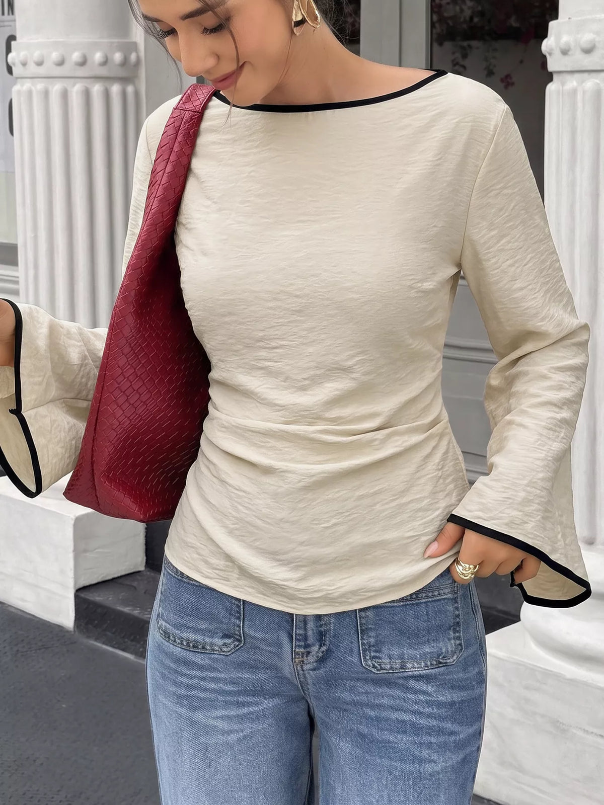 Plush Fashion Hub contrast trim flare sleeve blouse with stylish design and feminine silhouette, shown on a white background.