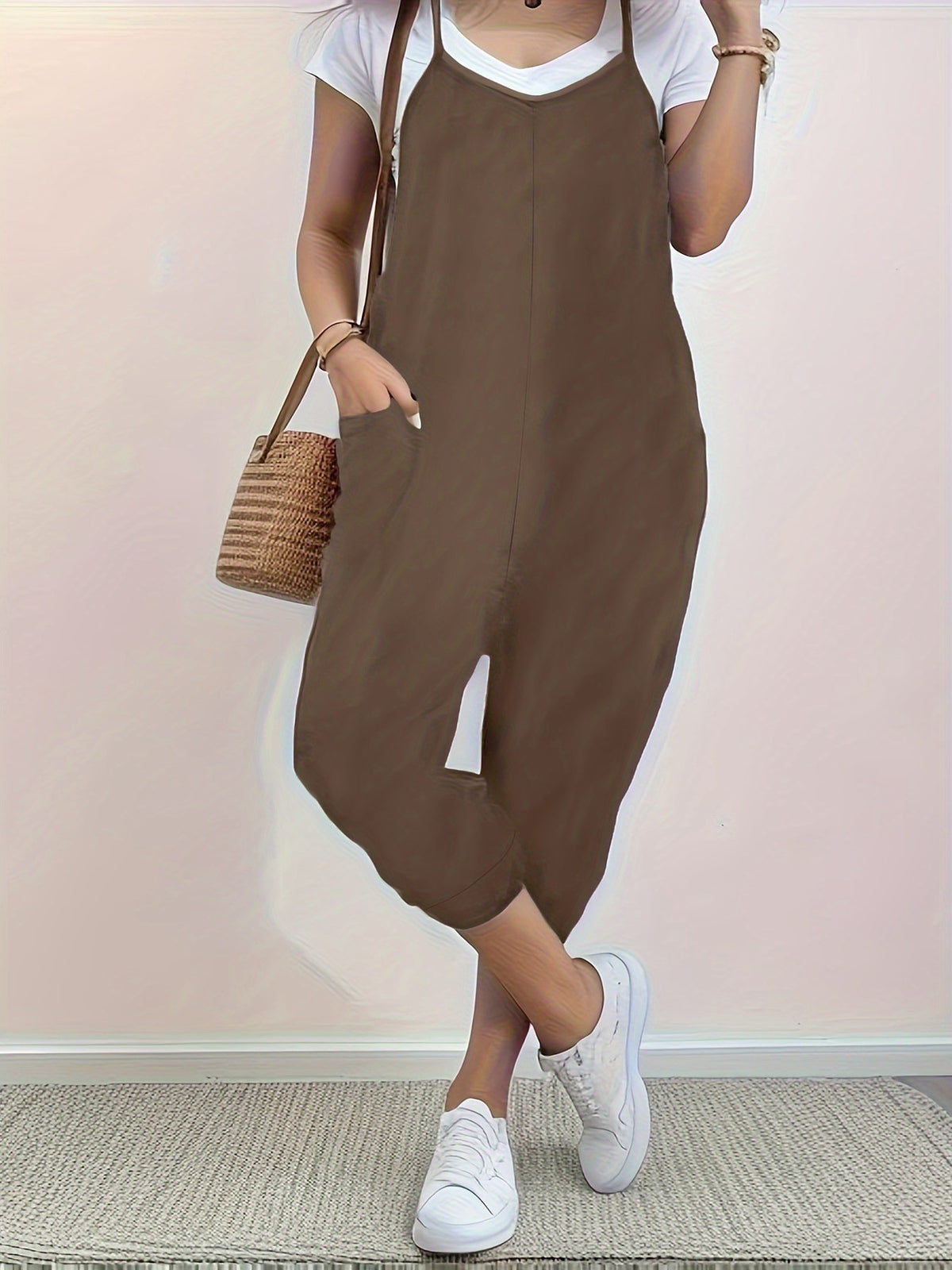 Casual loose fit spaghetti strap jumpsuit by Plush Fashion Hub with side pockets, lightweight and comfortable for everyday wear.