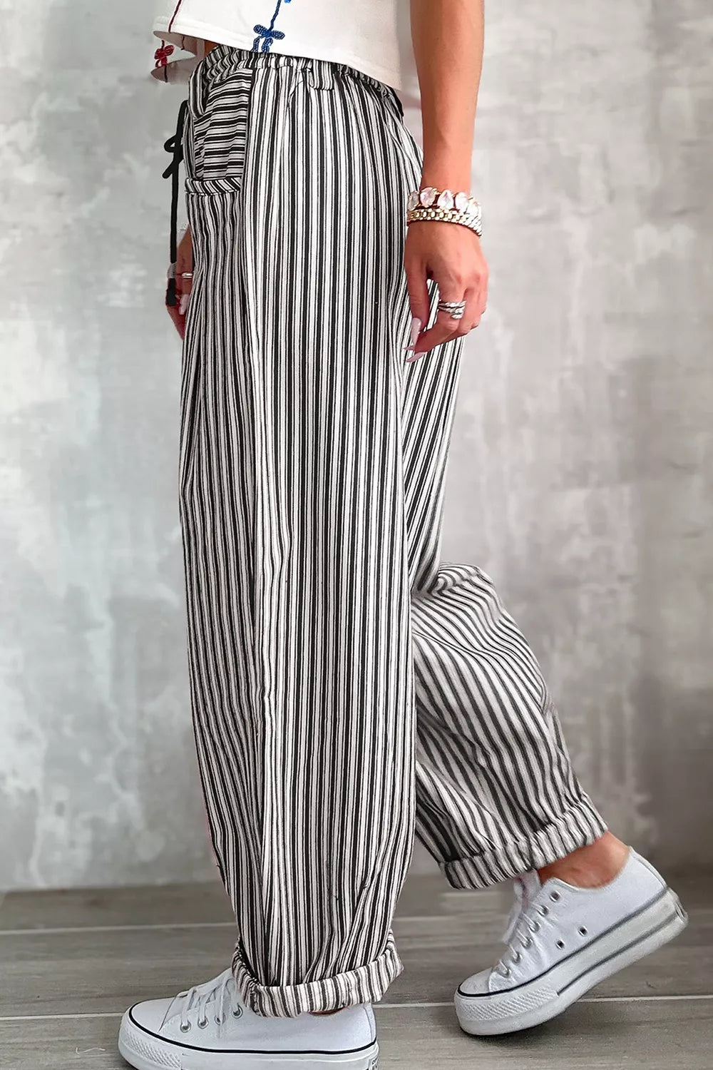 Trendsi stripe drawstring casual loose pants with relaxed fit and adjustable waistband, featuring stylish stripe design and comfortable fabric.
