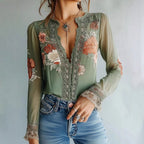 Women’s V-neck floral print blouse by FitiqueFit, casualwear, featuring a vibrant floral pattern and lightweight fabric.