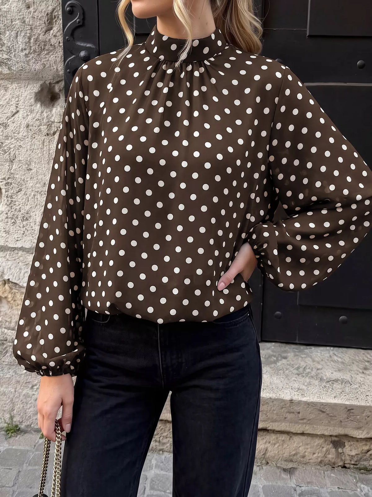 Polka dot mock neck long sleeve blouse by Trendsi, featuring a stylish design with a comfortable fit and classic pattern.