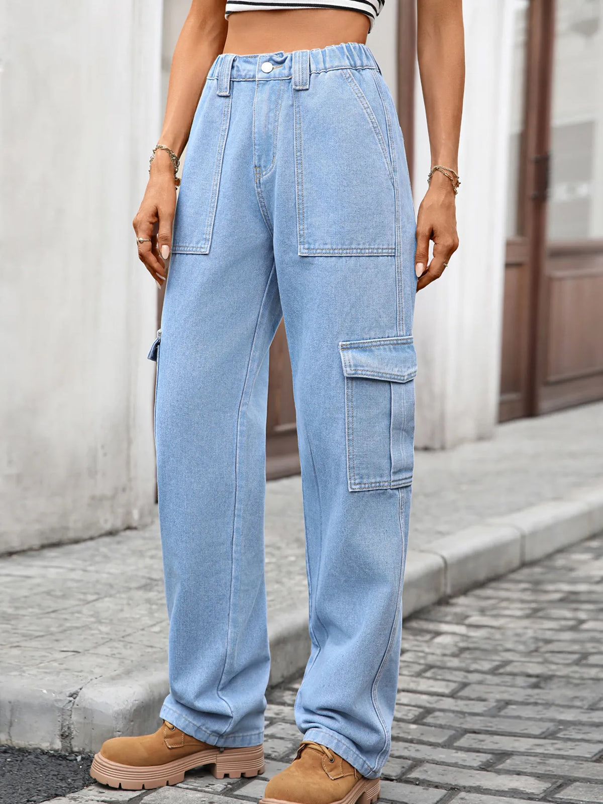 High-waisted cargo denim jeans by Plush Fashion Hub featuring functional pockets and a trendy relaxed fit.