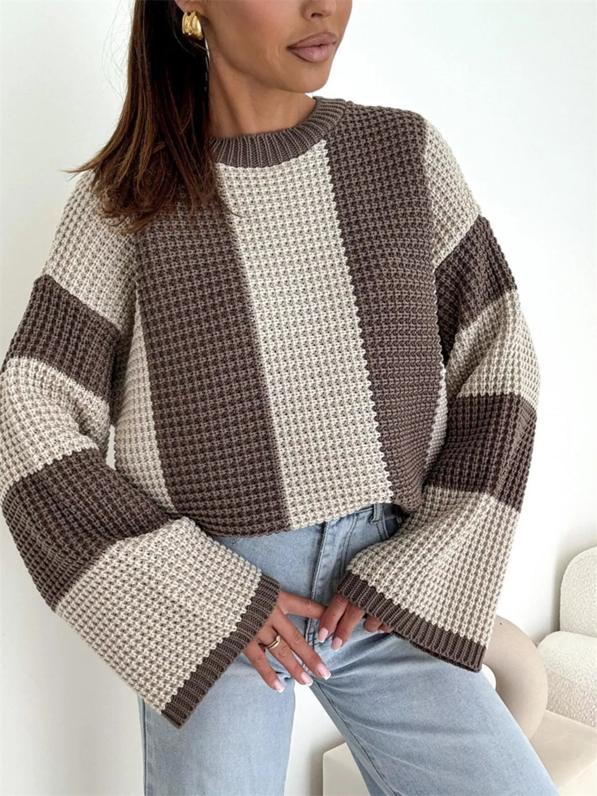 Color block long sleeve sweater from Trendsi featuring a stylish multicolor design and soft knit fabric.