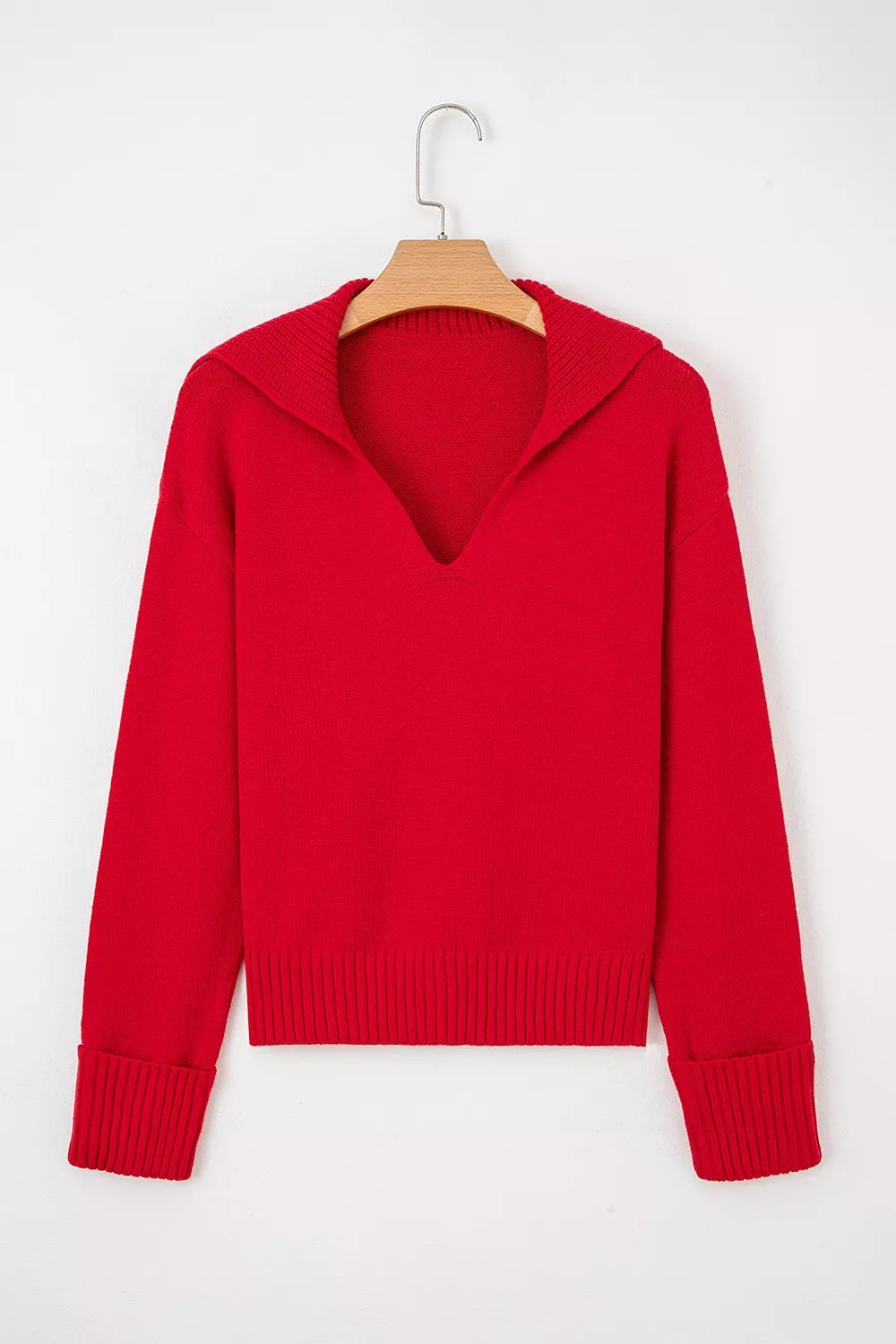 Womens ribbed hem long sleeve sweater by Trendsi, featuring a fitted design with ribbed details at the hem and long sleeves.