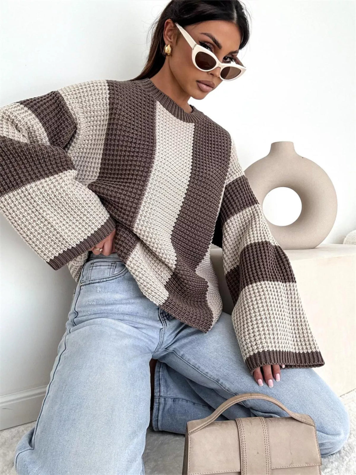 Color block long sleeve sweater by Trendsi featuring a stylish multi-color design and cozy fit, shown on a model.