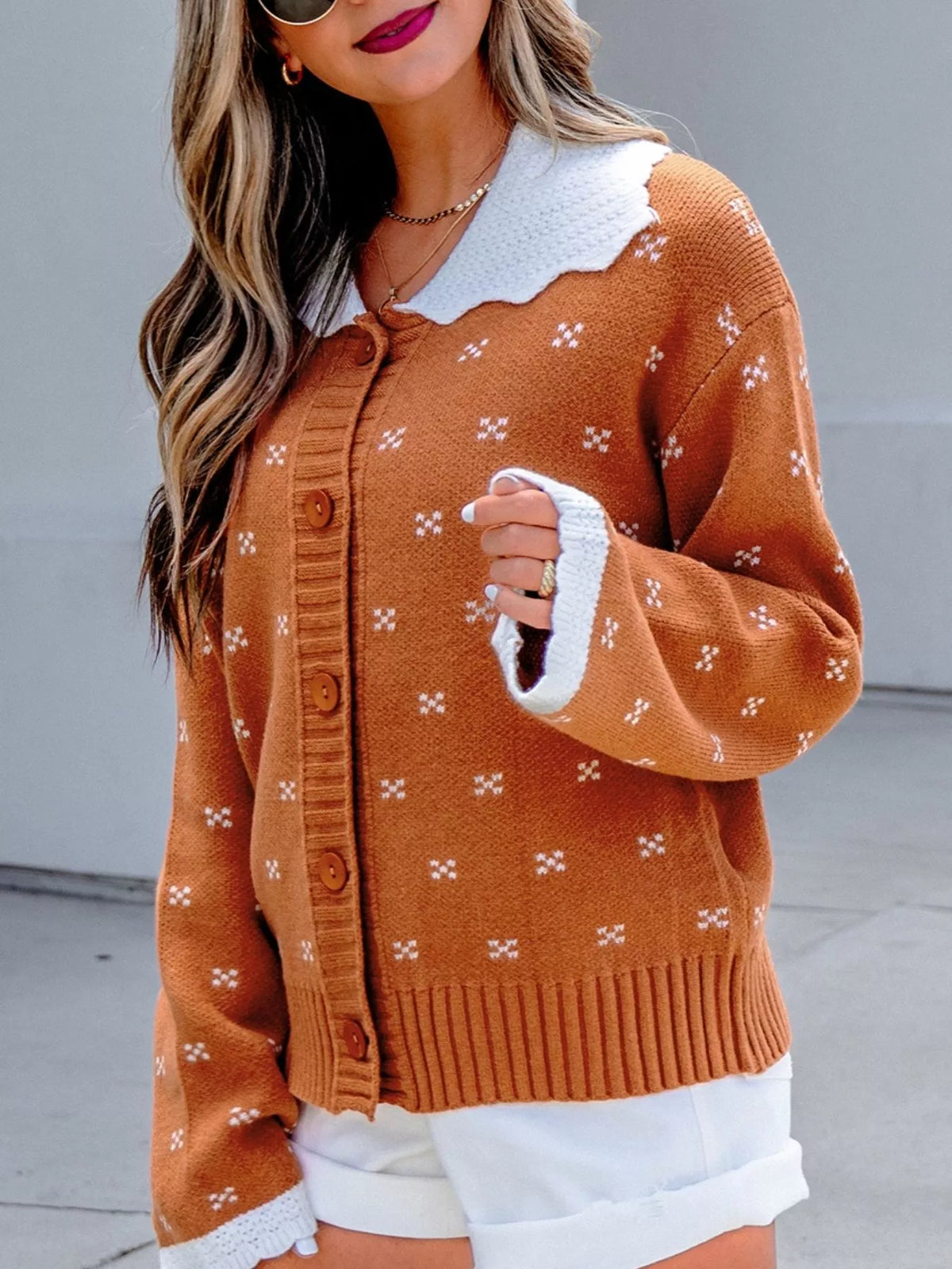 Colorblock Peter Pan collar long sleeve knit cardigan for women by Trendsi, featuring a stylish colorblock design and cozy knit fabric.