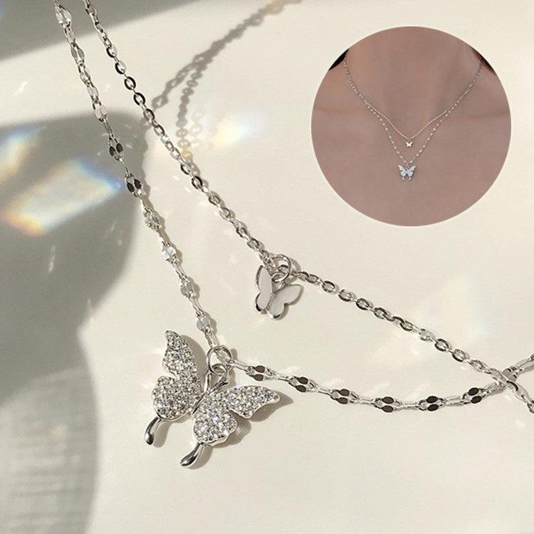 Fashion Jewelry Elegant Silver Color Shiny Butterfly Necklaces Ladies Introducing the stunning "Fashion Jewelry Elegant Silver Color Shiny Butterfly Necklaces" from Plush Fashions Shop Vintage Summer Spice. This exquisite double layer NecklacePlush Fashions ShopPlush Fashion Shop