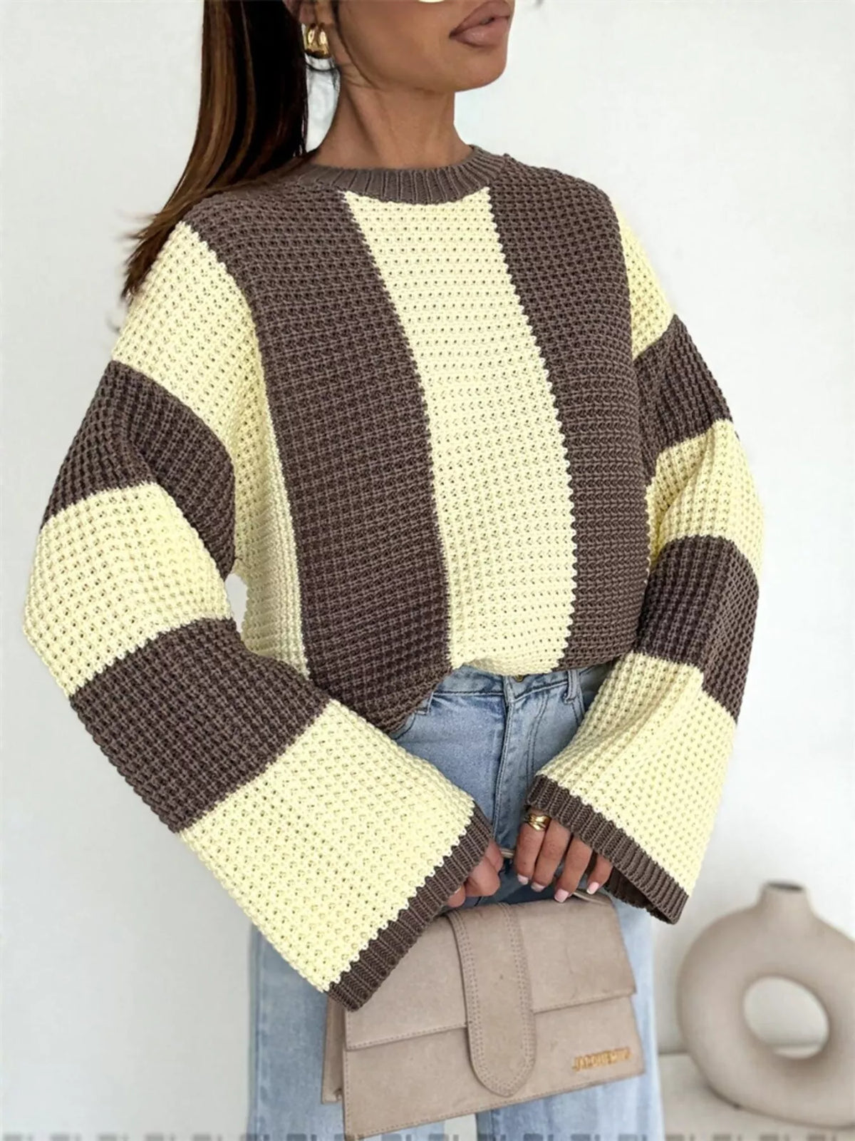Color block long sleeve sweater by Trendsi featuring a vibrant multi-colored design and a cozy, casual fit.